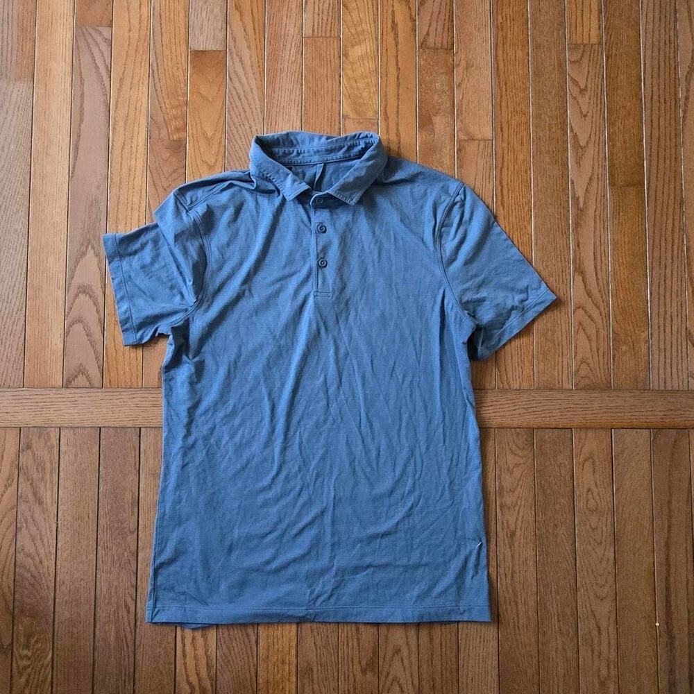 lululemon mens blue polo shirt. no tags. would fit a large.